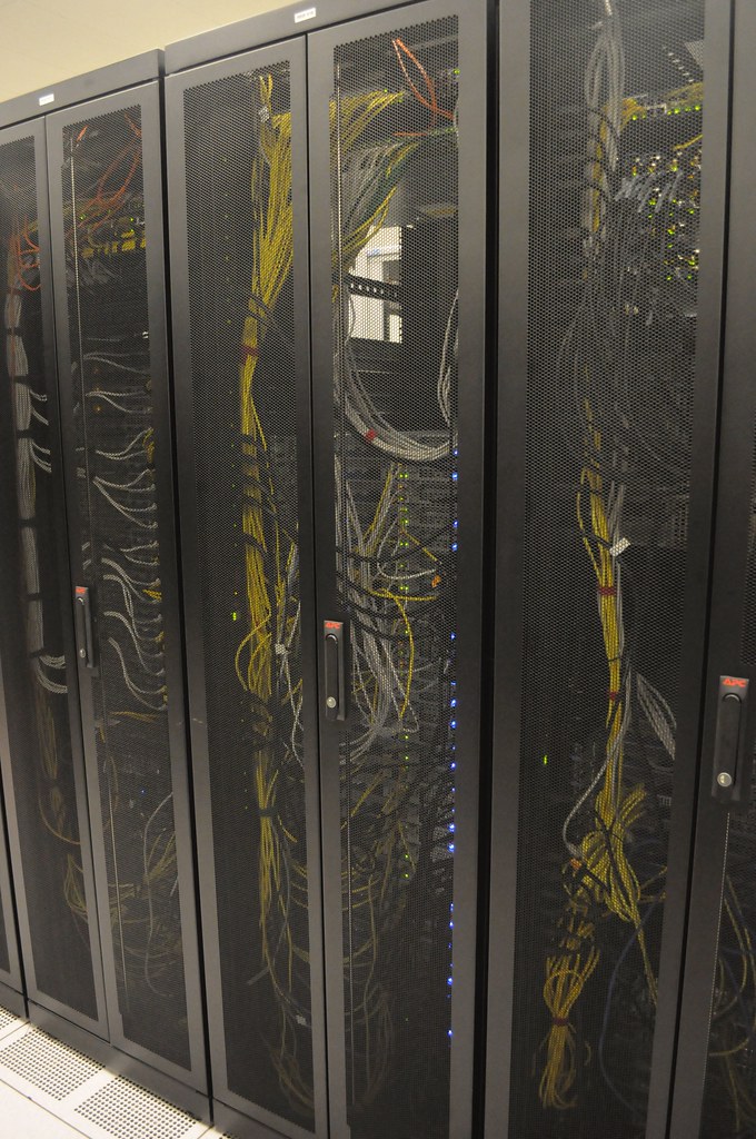 Data centre racks with yellow cabling